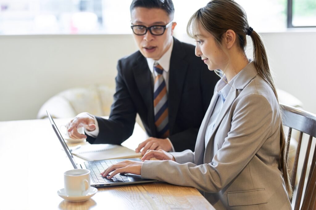 Business woman learning work from seniors